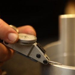 Measuring thickness of metal.