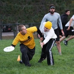 People playing ultimate frisbee.